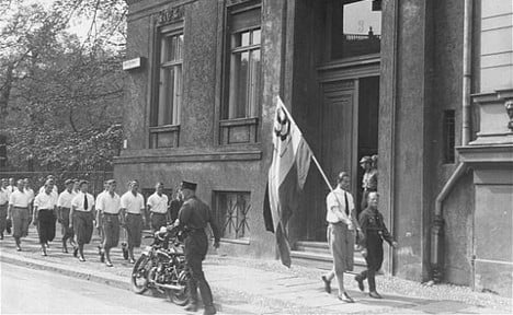 Nazis parade outside the Institute of Sexual Studies before pillaging it and burning its books. Photo: Wikimedia Commons